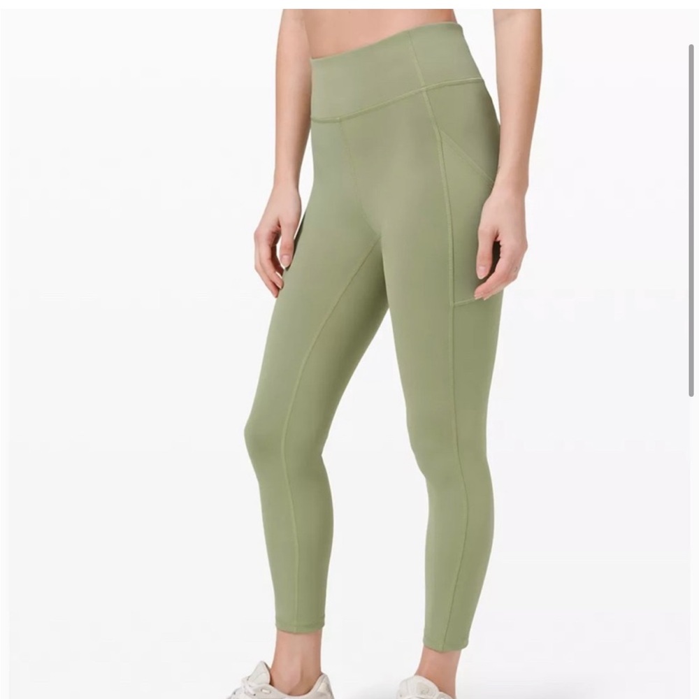 Worn once. Lululemon Invigorate 25” HR‎ Tight with Pockets, size 6, Willow Green